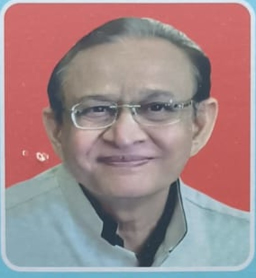 Portrait of Shri Pravin Ladhani, trustee of Shree Mahavir Clinic