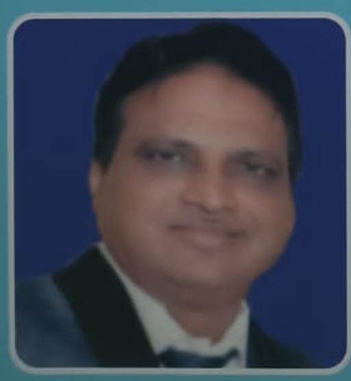 Portrait of Shri Suresh Duggad, trustee of Shree Mahavir Clinic